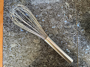 Whisk on granite countertop