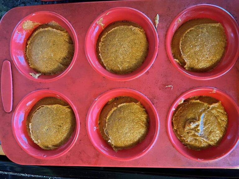 Buckwheat Pumpkin Muffin batter in muffin tin Buckwheat Pumpkin Muffin batter in muffin tin