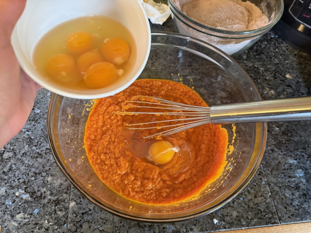 Buckwheat Chocolate Pumpkin Muffins 23 add in one egg at a time into pumpkin mixture and whisk together